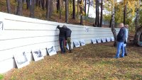 Участники проекта "Art wall" украсили стену у Камня основания города чёрно-белыми фотографиями